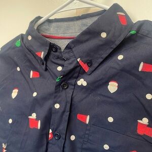 New holiday shirt by 88 brand. Red solo cups and Santas.  Ugly Christmas sweater